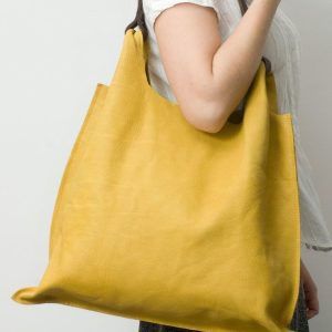 کیف چرم زرد رنگ زنانه